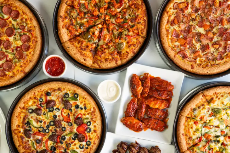 Pizzas and chicken wings