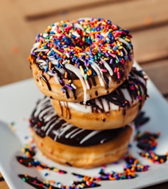 Stack of sprinkled doughnuts